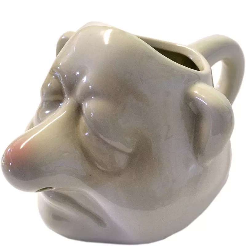 Mug shaped like a sleeping man's face