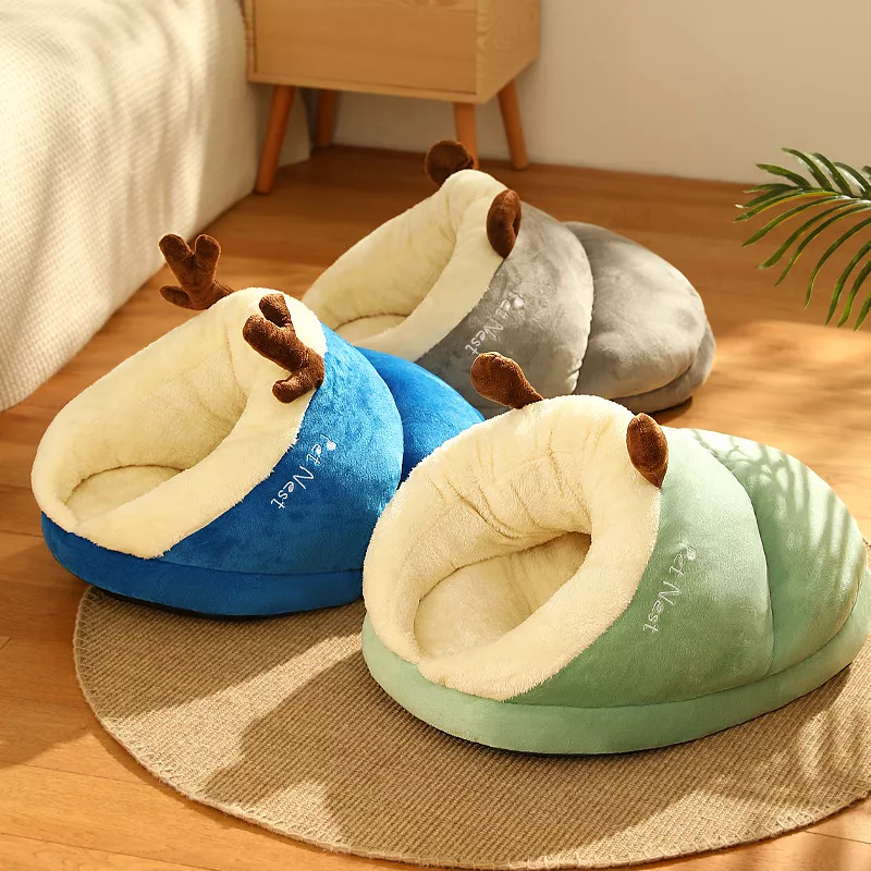 Colorful plush pet beds with antler design.