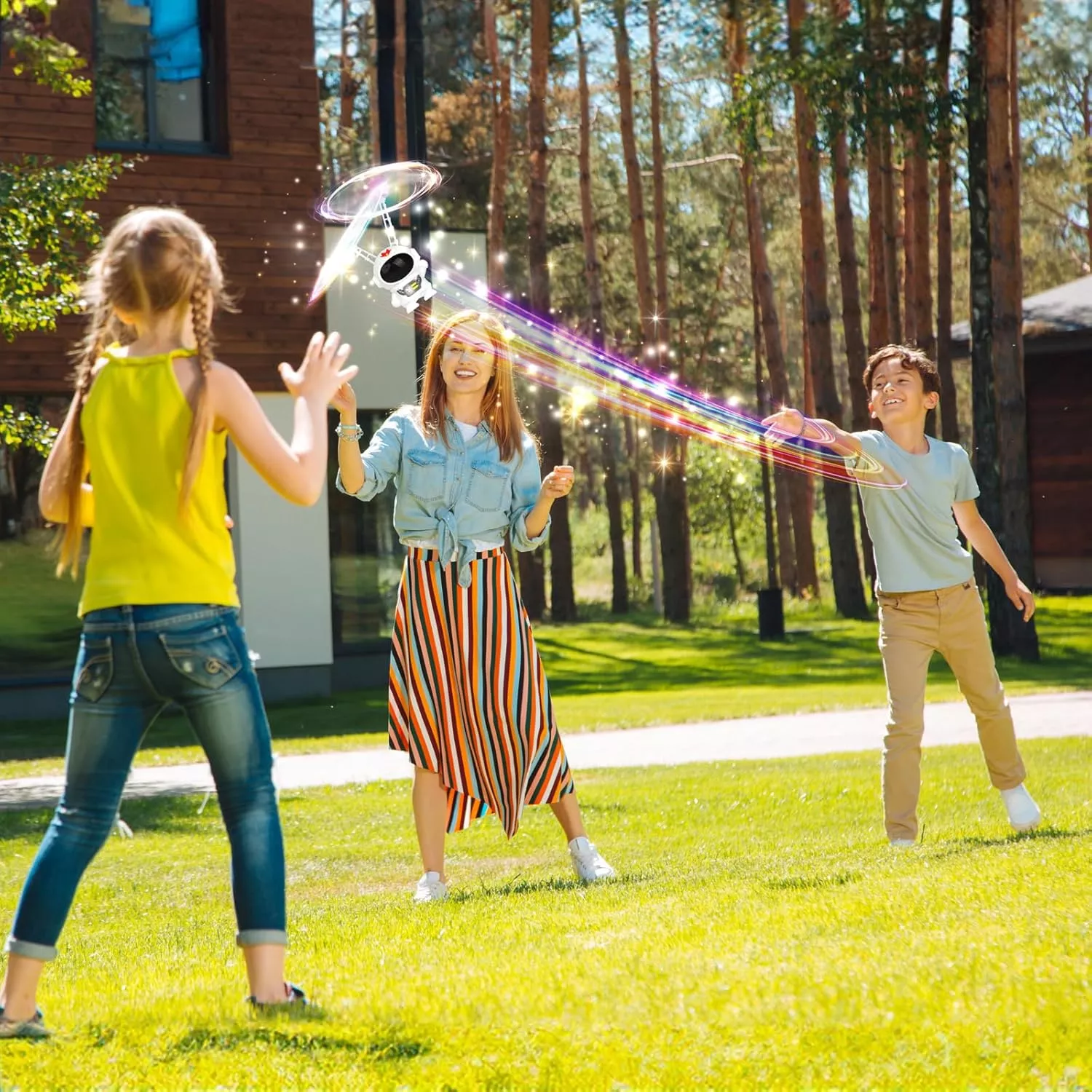 Children playing with lighted toy outdoors.