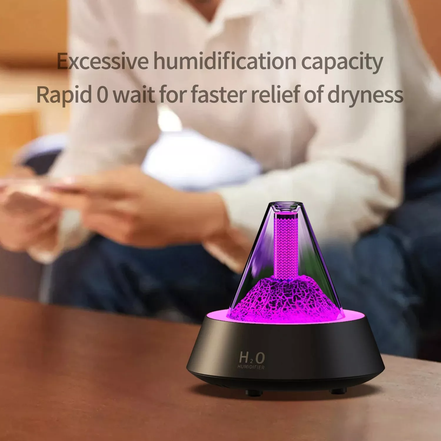 Purple LED humidifier with rapid moisture relief.