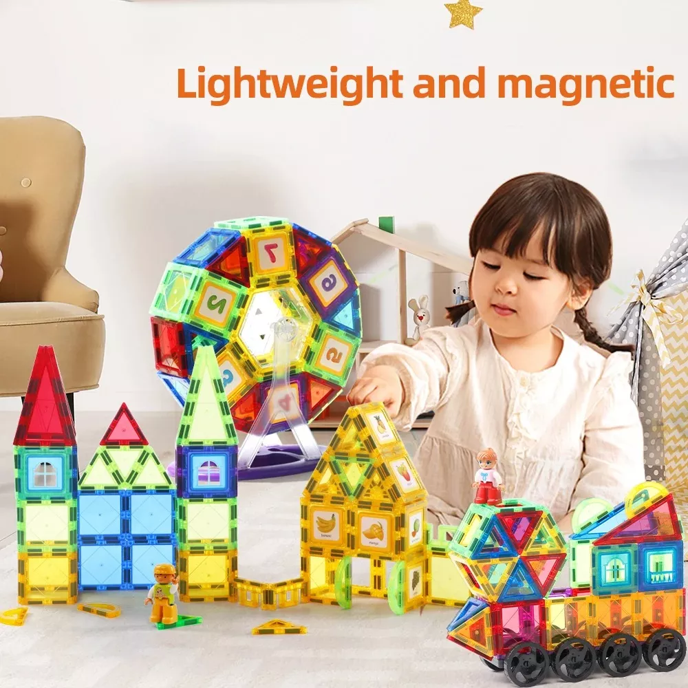Child playing with magnetic building blocks