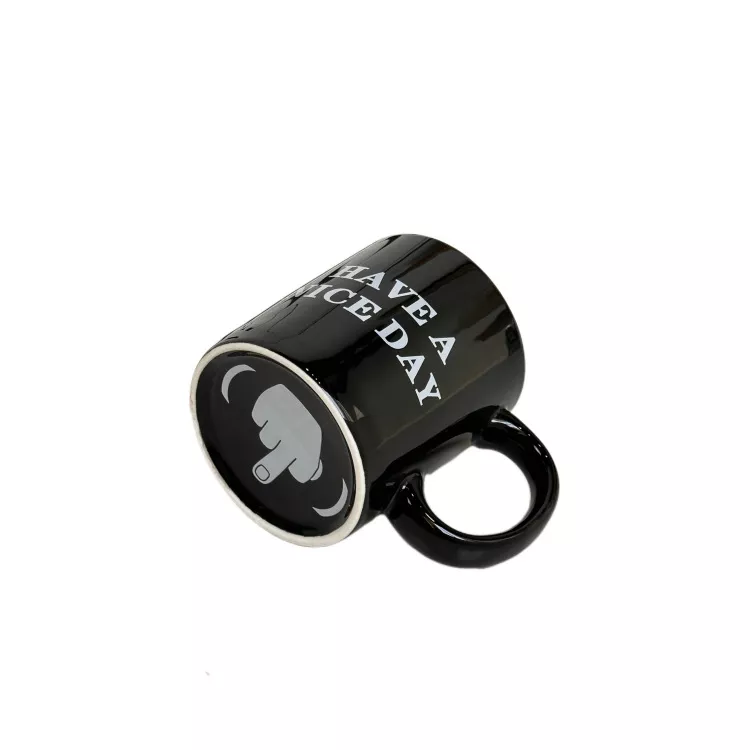Black mug with humorous design and message