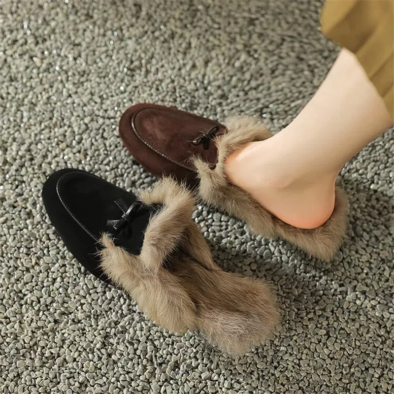 Fur-lined slippers on textured carpet